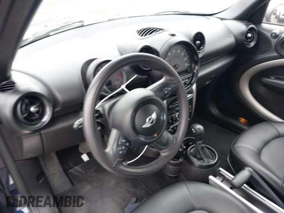 2016 MINI Countryman with VIN WMWZB3C55GWR46917, listed as a IAAI auction lot 42421995 with 23,157 mi miles and . Bid and sale history available at DreamBid. Image 20.