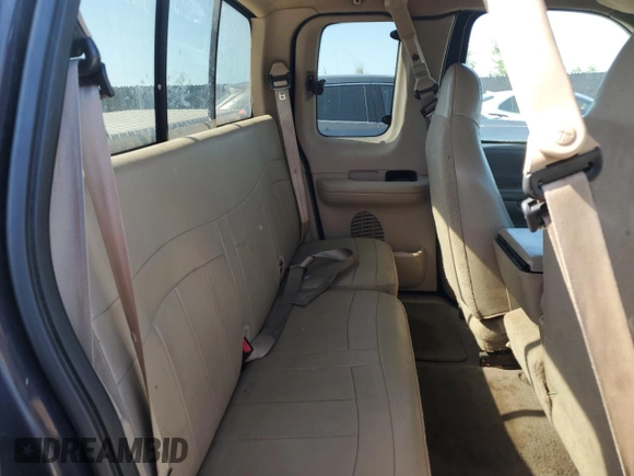 2000 Ford F-150 XL with VIN 1FTRX18L0YNB65908, listed as a Copart auction lot 54797585 with 298,924 mi miles and Clean title. Bid and sale history available at DreamBid. Image 10.