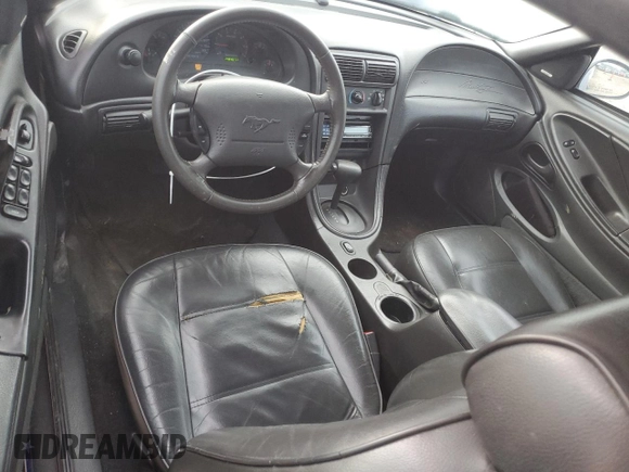 2004 Ford Mustang Deluxe with VIN 1FAFP444X4F107575, listed as a Copart auction lot 60908705 with 148,467 mi miles and Salvage title. Bid and sale history available at DreamBid. Image 8.