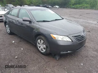 2007 Toyota Camry CE with VIN 4T1BE46K77U129152, listed as a IAAI auction lot 41954966 with 203,722 mi miles and . Bid and sale history available at DreamBid. Image 1.