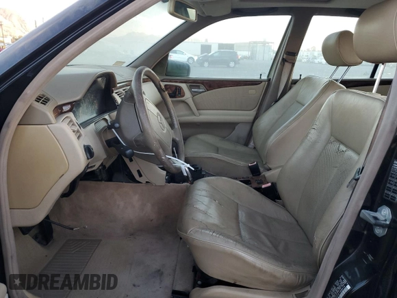 1998 Mercedes-Benz E 320 with VIN WDBJF25F4WA625790, listed as a Copart auction lot 87920735 with 179,382 mi miles and Clean Title. Bid and sale history available at DreamBid. Image 7.