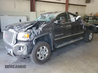 2016 GMC Sierra 3500HD Denali z VIN 1GT42YE82GF247214, wystawiony jako Copart lot #77745694 z przebiegiem 152 252 mil mil oraz Szkoda całkowita • Salvage title. Historia ofert i sprzedaży dostępna na DreamBid. Obrazek 1.