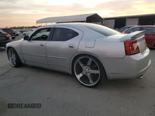 2006 Dodge Charger SRT-8 with VIN 2B3KA73W26H279925, listed as a Copart auction lot 78479574 with 127,443 mi miles and Salvage Title. Bid and sale history available at DreamBid. Image 2.