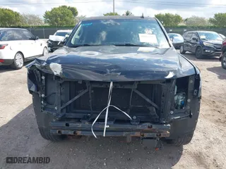 2015 Chevrolet Tahoe LTZ with VIN 1GNSCCKC7FR746028, listed as a IAAI auction lot 41674775 with 198,067 mi miles. Bid and sale history available at carsss.com. Image 6.