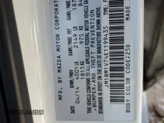 2014 Mazda 3 i Touring z VIN JM1BM1V74E1199435, wystawiony jako Copart lot #80288274 z przebiegiem 148 000 mil mil oraz Szkoda całkowita • Salvage title. Historia ofert i sprzedaży dostępna na DreamBid. Obrazek 12.