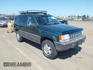 1995 Jeep Grand Cherokee Laredo with VIN 1J4GZ58Y2SC669152, listed as a IAAI auction lot 42077067 with 134,022 mi miles. Bid and sale history available at carsss.com. Image 1.