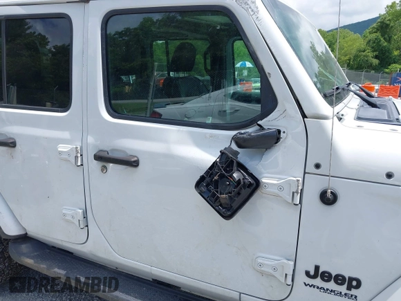 2021 Jeep Wrangler Unlimited Sahara z VIN 1C4HJXEN6MW764662, wystawiony jako IAAI lot #42494617 z przebiegiem 81 954 mil mil oraz . Historia ofert i sprzedaży dostępna na DreamBid. Obrazek 13.