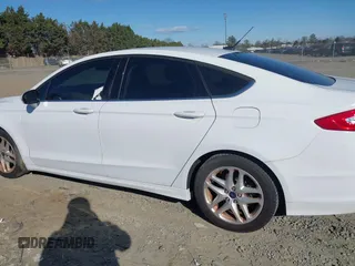 2015 Ford Fusion SE with VIN 3FA6P0H79FR203135, listed as a IAAI auction lot 41002631 with 110,485 mi miles and . Bid and sale history available at DreamBid. Image 14.