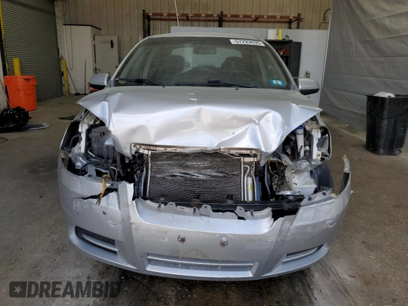 2011 Chevrolet Aveo 1LT with VIN KL1TD5DE2BB230142, listed as a Copart auction lot 57293695 with Not provided miles and Salvage title. Bid and sale history available at DreamBid. Image 5.