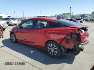 2021 Toyota Prius LE with VIN JTDKAMFP8M3179507, listed as a Copart auction lot 52571255 with 88,966 mi miles and Salvage Title. Bid and sale history available at DreamBid. Image 2.