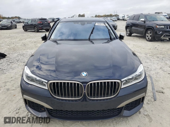 2019 BMW 7 Series M760i xDrive with VIN WBA7H6C51KG615276, listed as a Copart auction lot 79597234 with 39,195 mi miles and Salvage Title. Bid and sale history available at carsss.com. Image 5.