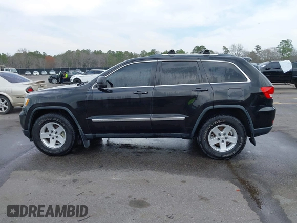 2012 Jeep Grand Cherokee Laredo with VIN 1C4RJEAG2CC259279, listed as a IAAI auction lot 41768024 with 185,161 mi miles. Bid and sale history available at carsss.com. Image 15.