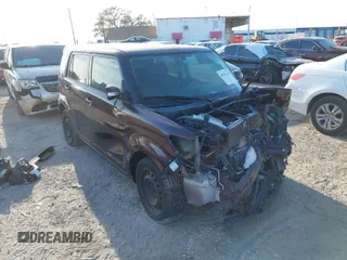 2010 Scion xB with VIN JTLZE4FE8A1113455, listed as a IAAI auction lot 40523410 with 1 mi miles. Bid and sale history available at carsss.com. Image 1.