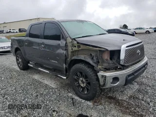 2013 Toyota Tundra 4WD Truck with VIN 5TFDW5F10DX315388, listed as a Copart auction lot 71286744 with 233,589 mi miles and Salvage Title. Bid and sale history available at carsss.com. Image 4.