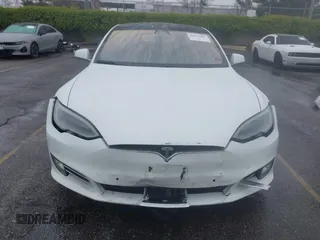 2018 Tesla Model S 75D with VIN 5YJSA1E24JF275038, listed as a IAAI auction lot 41916984 with 116,352 mi miles and . Bid and sale history available at DreamBid. Image 12.