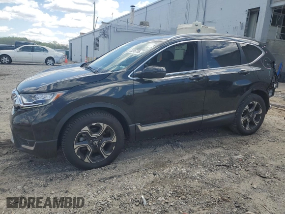 2017 Honda CR-V Touring with VIN 5J6RW1H93HL003929, listed as a Copart auction lot 53295705 with 67,097 mi miles and Salvage Title. Bid and sale history available at carsss.com. Image 1.