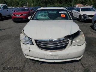 2009 Chrysler Sebring Limited with VIN 1C3LC56V39N566582, listed as a Copart auction lot 70522454 with 148,113 mi miles and Salvage Title. Bid and sale history available at carsss.com. Image 5.