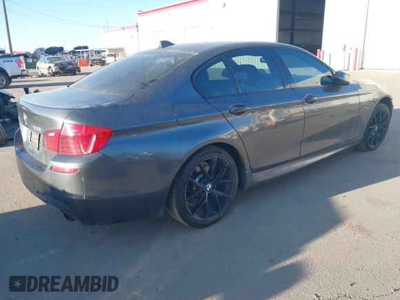 2015 BMW 5 Series 535i xDrive with VIN WBA5B3C58FD547704, listed as a IAAI auction lot 41764129 with 152,649 mi miles. Bid and sale history available at carsss.com. Image 4.
