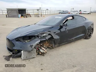 2020 Tesla Model S Performance with VIN 5YJSA1E49LF390948, listed as a Copart auction lot 47313715 with 95,143 mi miles and Salvage title. Bid and sale history available at DreamBid. Image 1.