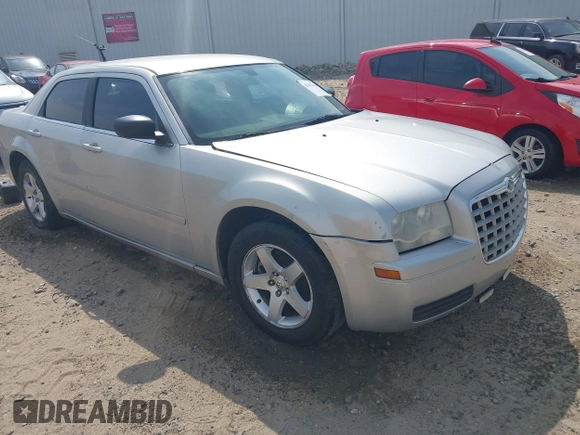 2006 Chrysler 300 with VIN 2C3KA43R96H505406, listed as a IAAI auction lot 42047014 with 257,628 mi miles. Bid and sale history available at carsss.com. Image 1.