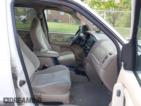 2001 Mazda Tribute LX with VIN 4F2YU09131KM12857, listed as a IAAI auction lot 42034605 with 257,015 mi miles and . Bid and sale history available at carsss.com. Image 5.