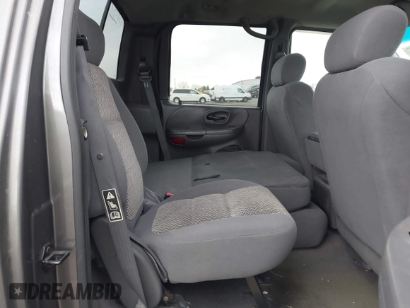 2003 Ford F-150 XLT with VIN 1FTRW086X3KA54557, listed as a IAAI auction lot 41888037 with 217,512 mi miles. Bid and sale history available at carsss.com. Image 8.