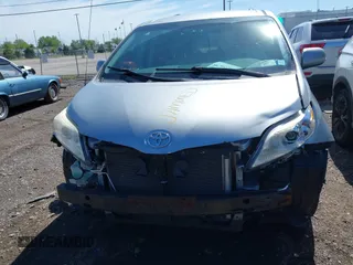 2014 Toyota Sienna LE AAS with VIN 5TDKK3DC4ES464406, listed as a IAAI auction lot 42296795 with 170,320 mi miles and . Bid and sale history available at DreamBid. Image 12.