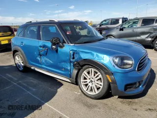 2020 MINI Countryman Cooper with VIN WMZYW5C04L3L05160, listed as a Copart auction lot 76865194 with 70,929 mi miles and Salvage Title. Bid and sale history available at carsss.com. Image 4.