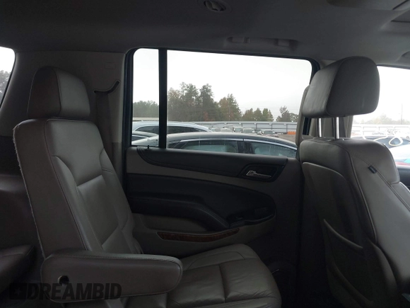 2016 Chevrolet Suburban LTZ with VIN 1GNSCJKC2GR111370, listed as a IAAI auction lot 40742857 with 199,753 mi miles and . Bid and sale history available at DreamBid. Image 8.