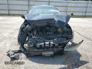 2015 Ford Focus SE with VIN 1FADP3F24FL201209, listed as a Copart auction lot 60474755 with 174,194 mi miles and Salvage title. Bid and sale history available at DreamBid. Image 5.