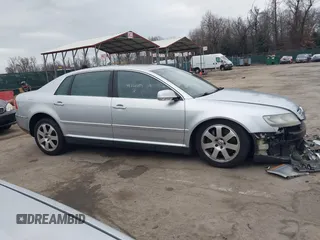 2004 Volkswagen Phaeton V8 z VIN WVWAF63D548007862, wystawiony jako IAAI lot #41721419 z przebiegiem 87 974 mil mil oraz . Historia ofert i sprzedaży dostępna na DreamBid. Obrazek 13.