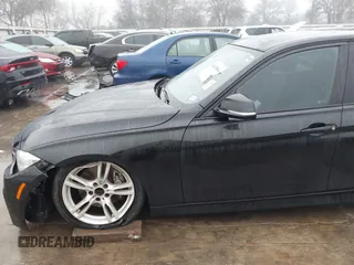 2014 BMW 3 Series 335i with VIN WBA3A9C57EF477662, listed as a IAAI auction lot 41435544 with 129,543 mi miles. Bid and sale history available at carsss.com. Image 18.