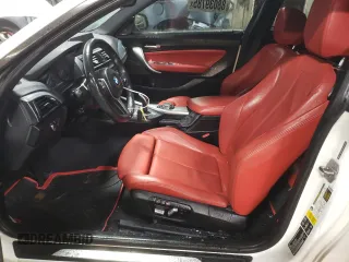 2016 BMW 2 Series M235i xDrive with VIN WBA1J9C50GV372185, listed as a Copart auction lot 88039785 with 84,187 mi miles and Salvage Title. Bid and sale history available at carsss.com. Image 7.