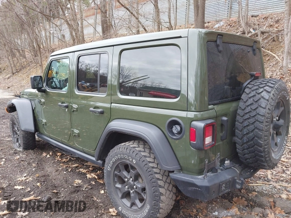 2021 Jeep Wrangler Unlimited Willys with VIN 1C4HJXDNXMW579595, listed as a IAAI auction lot 41930989 with 32,148 mi miles and . Bid and sale history available at DreamBid. Image 3.