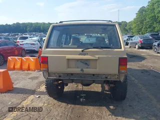 1995 Jeep Cherokee Sport with VIN 1J4FJ68S3SL555908, listed as a IAAI auction lot 42222016 with 283,444 mi miles and . Bid and sale history available at DreamBid. Image 16.