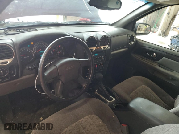 2004 GMC Envoy SLT with VIN 1GKDT13S342336784, listed as a Copart auction lot 66704184 with 169,431 mi miles and Salvage Title. Bid and sale history available at DreamBid. Image 8.