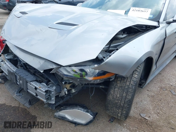 2020 Ford Mustang EcoBoost z VIN 1FA6P8TH2L5186210, wystawiony jako IAAI lot #42103657 z przebiegiem 68 790 mil mil oraz . Historia ofert i sprzedaży dostępna na DreamBid. Obrazek 6.