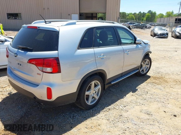 2015 Kia Sorento LX with VIN 5XYKTCA68FG641582, listed as a IAAI auction lot 42063254 with 159,125 mi miles and . Bid and sale history available at DreamBid. Image 4.