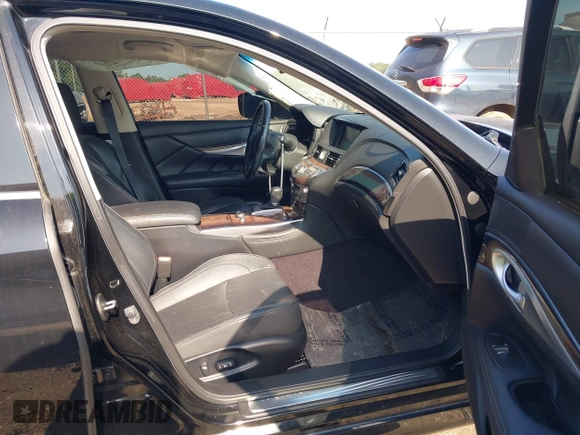 2012 Infiniti M Hybrid with VIN JN1EY1AP8CM910933, listed as a IAAI auction lot 42682477 with 157,048 mi miles and . Bid and sale history available at DreamBid. Image 5.