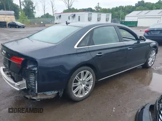 2015 Audi A8 3.0T z VIN WAU3GAFD9FN001343, wystawiony jako IAAI lot #39846084 z przebiegiem 105 242 mil mil oraz . Historia ofert i sprzedaży dostępna na DreamBid. Obrazek 4.