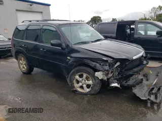 2005 Mazda Tribute S with VIN 4F2YZ04195KM65089, listed as a Copart auction lot 70993244 with Not Provided miles and Salvage Title. Bid and sale history available at carsss.com. Image 4.