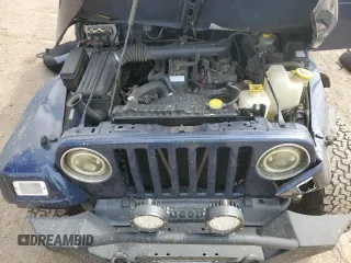 2002 Jeep Wrangler Sport z VIN 1J4FA49SX2P772609, wystawiony jako Copart lot #55893425 z przebiegiem 157 653 mil mil oraz Szkoda całkowita • Salvage title. Historia ofert i sprzedaży dostępna na DreamBid. Obrazek 12.