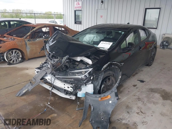 2024 Toyota Prius LE with VIN JTDACAAU3R3032357, listed as a IAAI auction lot 41914598 with 15,360 mi miles and . Bid and sale history available at DreamBid. Image 6.