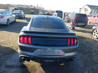 2021 Ford Mustang GT z VIN 1FA6P8CF9M5117126, wystawiony jako IAAI lot #41647619 z przebiegiem 31 076 mil mil oraz . Historia ofert i sprzedaży dostępna na DreamBid. Obrazek 17.