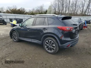 2016 Mazda CX-5 Grand Touring with VIN JM3KE4DY0G0727366, listed as a Copart auction lot 51682115 with 114,462 mi miles and Salvage Title. Bid and sale history available at carsss.com. Image 2.