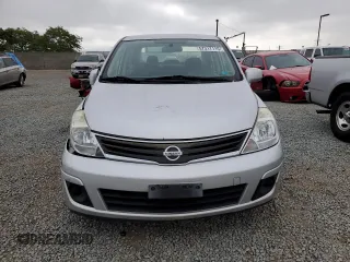 2011 Nissan Versa S with VIN 3N1BC1AP9BL458761, listed as a Copart auction lot 57317115 with 122,606 mi miles and Salvage title. Bid and sale history available at DreamBid. Image 5.