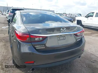 2016 Mazda Mazda6 i Sport with VIN JM1GJ1U56G1422012, listed as a IAAI auction lot 40693636 with 93,094 mi miles. Bid and sale history available at carsss.com. Image 16.