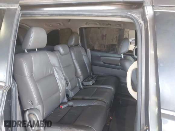2012 Honda Odyssey EX-L with VIN 5FNRL5H67CB016934, listed as a IAAI auction lot 42405714 with 248,512 mi miles and . Bid and sale history available at DreamBid. Image 8.