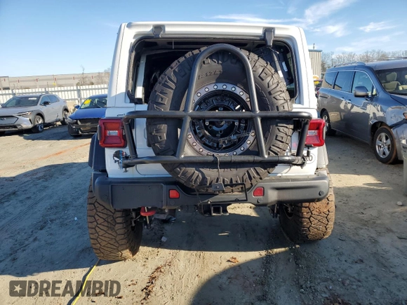 2022 Jeep Wrangler Unlimited Rubicon z VIN 1C4HJXFN2NW211037, wystawiony jako Copart lot #85078474 z przebiegiem 21 878 mil mil oraz Szkoda całkowita • Salvage title. Historia ofert i sprzedaży dostępna na DreamBid. Obrazek 6.