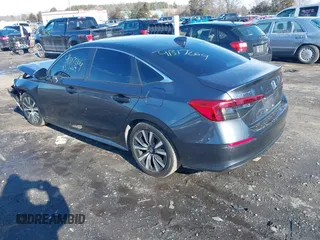 2023 Honda Civic Sedan EX with VIN 2HGFE1F75PH319522, listed as a IAAI auction lot 41317264 with 27,089 mi miles. Bid and sale history available at carsss.com. Image 3.